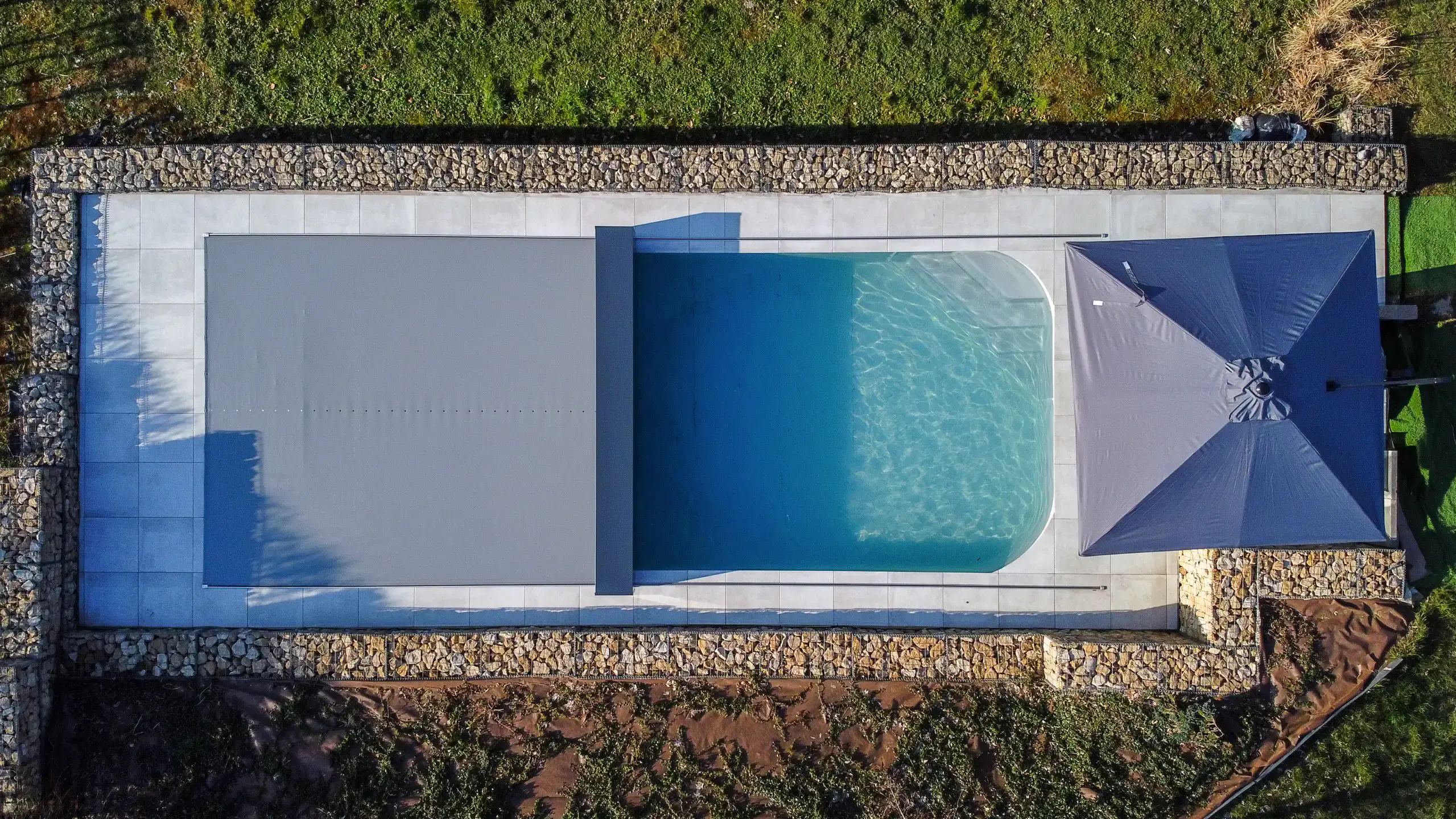 a swimming pool with a roof