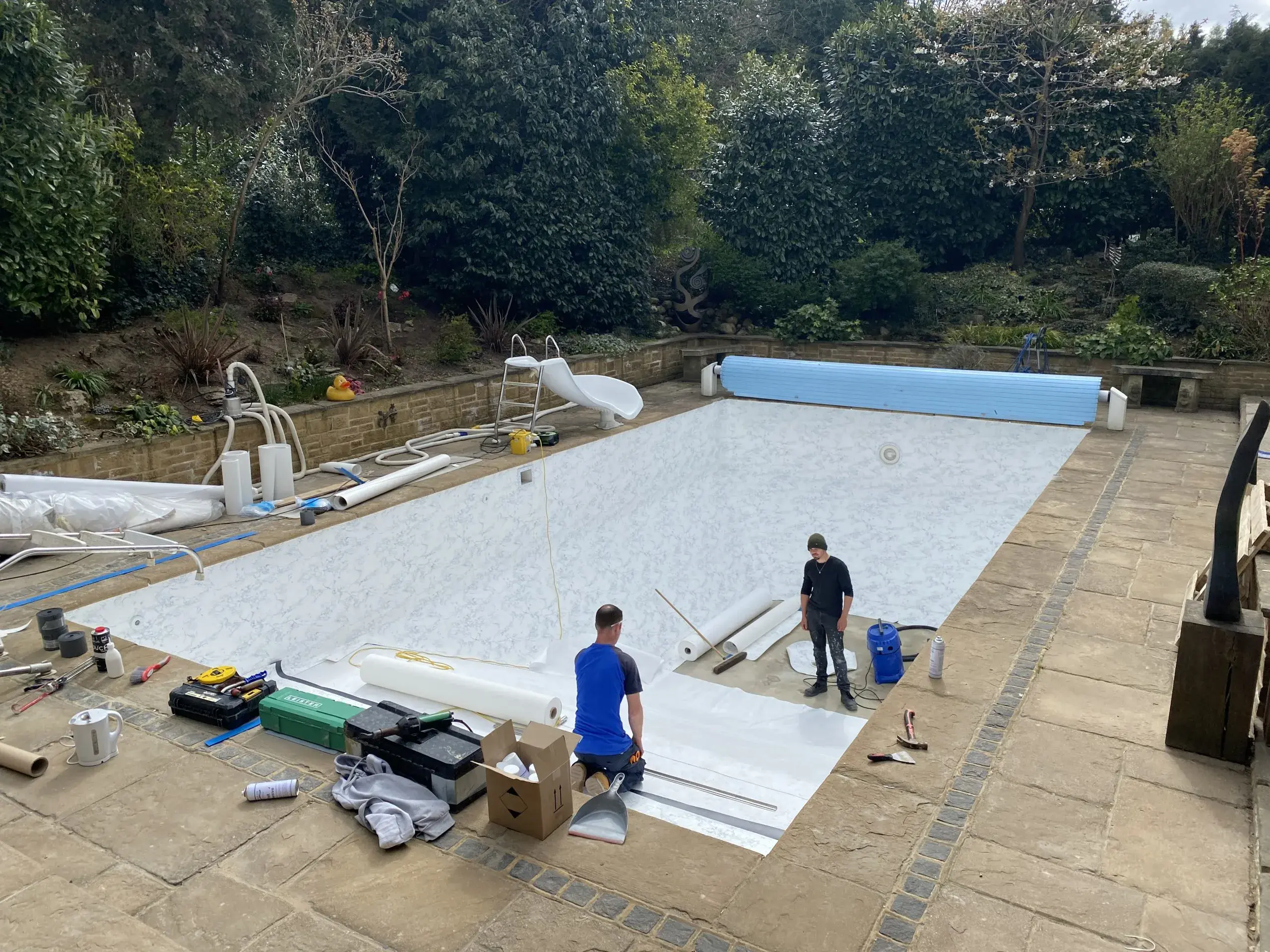 a pool being constructed with a pool cover