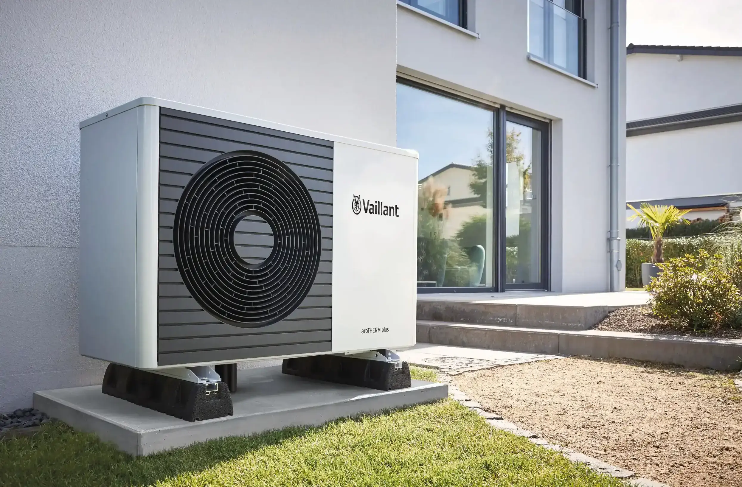 a white and black machine outside a building